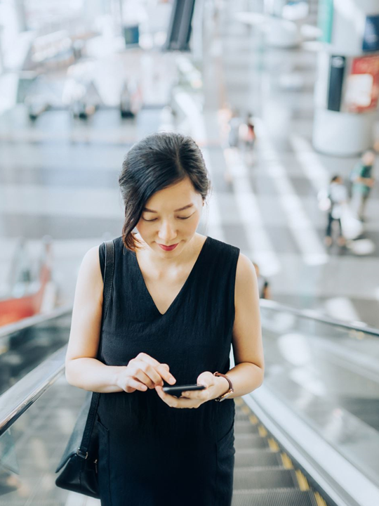 Woman looking at mobile phone